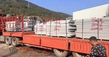 拉萨 芝麻灰花岗岩光面毛板出货日常